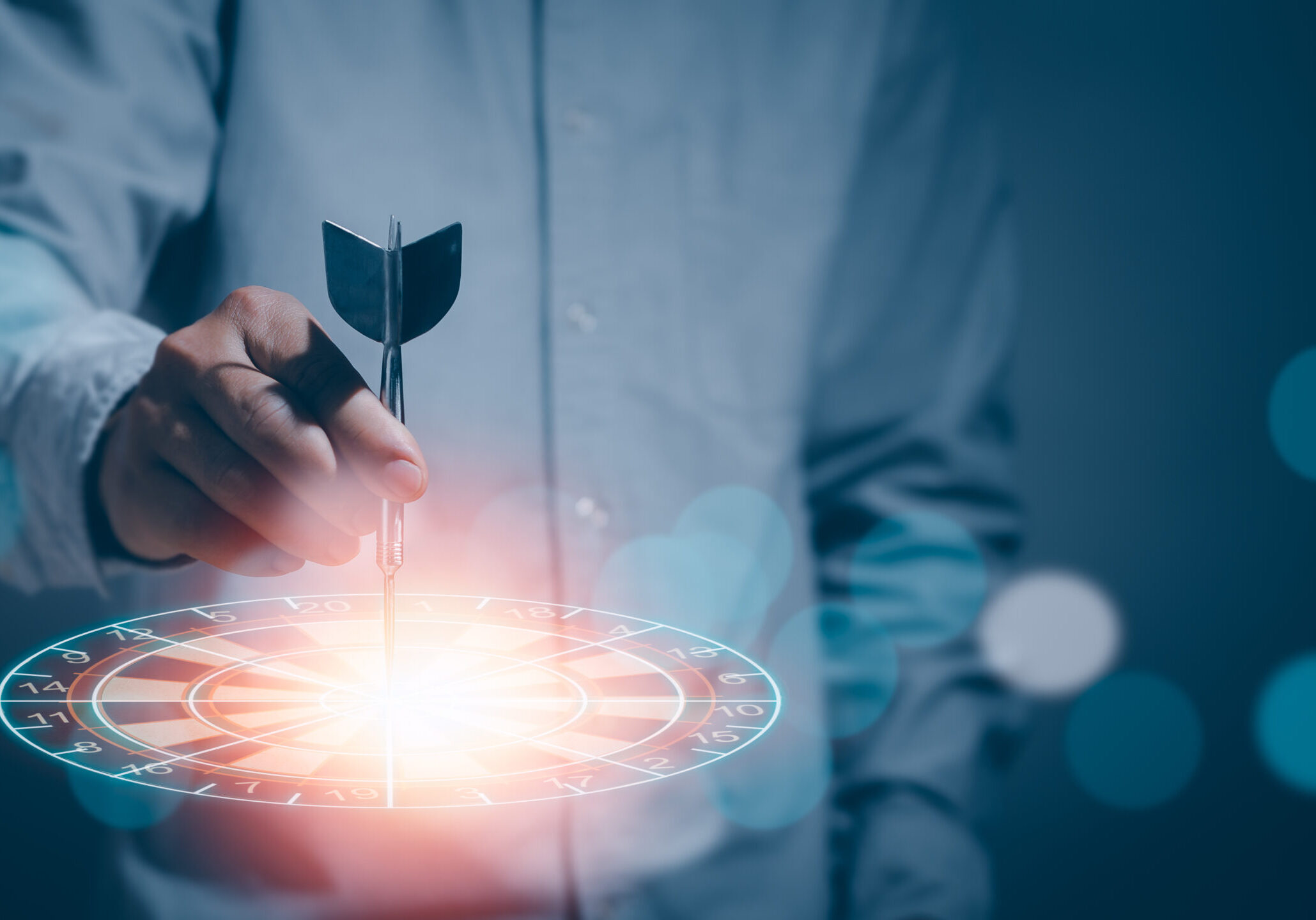 hand holding darts and dart board icon ,concept of target and su hand holding darts and dart board icon ,concept of target and successful goals conduct business efficiently through strategy to achieve the best results of targeted business.